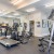 Large fitness center with ample lighting at Heron Lake