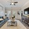 Ceiling fan and light fixture in living room at Heron Lake