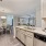 Well lit kitchen next to dining area at Heron Lake