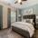 Large windows brighten spacious bedroom in units at Heron Lake