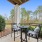 Furnished patio with railings and nature views at Heron Lake