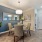 Overhead lighting fixture brightens dining area at Heron Lake