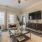 Spacious living room space with access to private balcony at Heron Lake